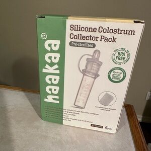 Brand new still in box Hakka colostrum collectors